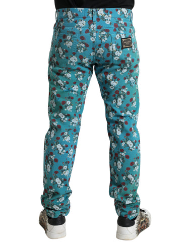 Blue floral print skinny cotton denim pants by Dolce & Gabbana, showing close-up of floral pattern and fitted style.