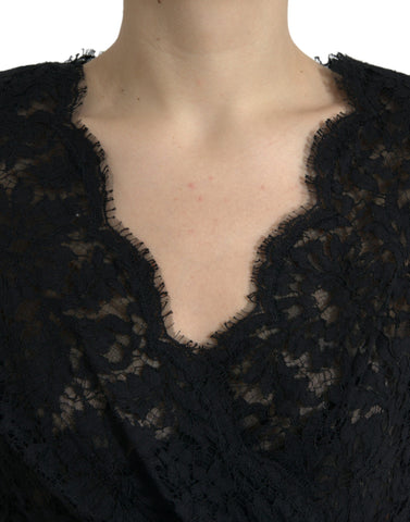 Black Dolce & Gabbana bodycon lace cotton sheath mini dress showcased on a model with fitted design and intricate lace details.
