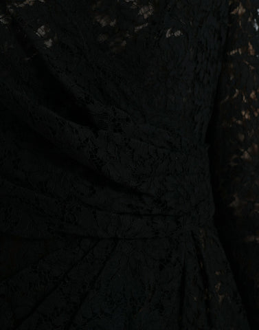 Black Dolce & Gabbana bodycon lace cotton sheath mini dress displayed on a hanger, showcasing its fitted silhouette and lace details.
