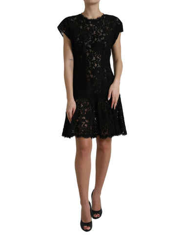 Black floral lace cotton A-line mini dress by Dolce & Gabbana with delicate lace details and a fitted bodice.