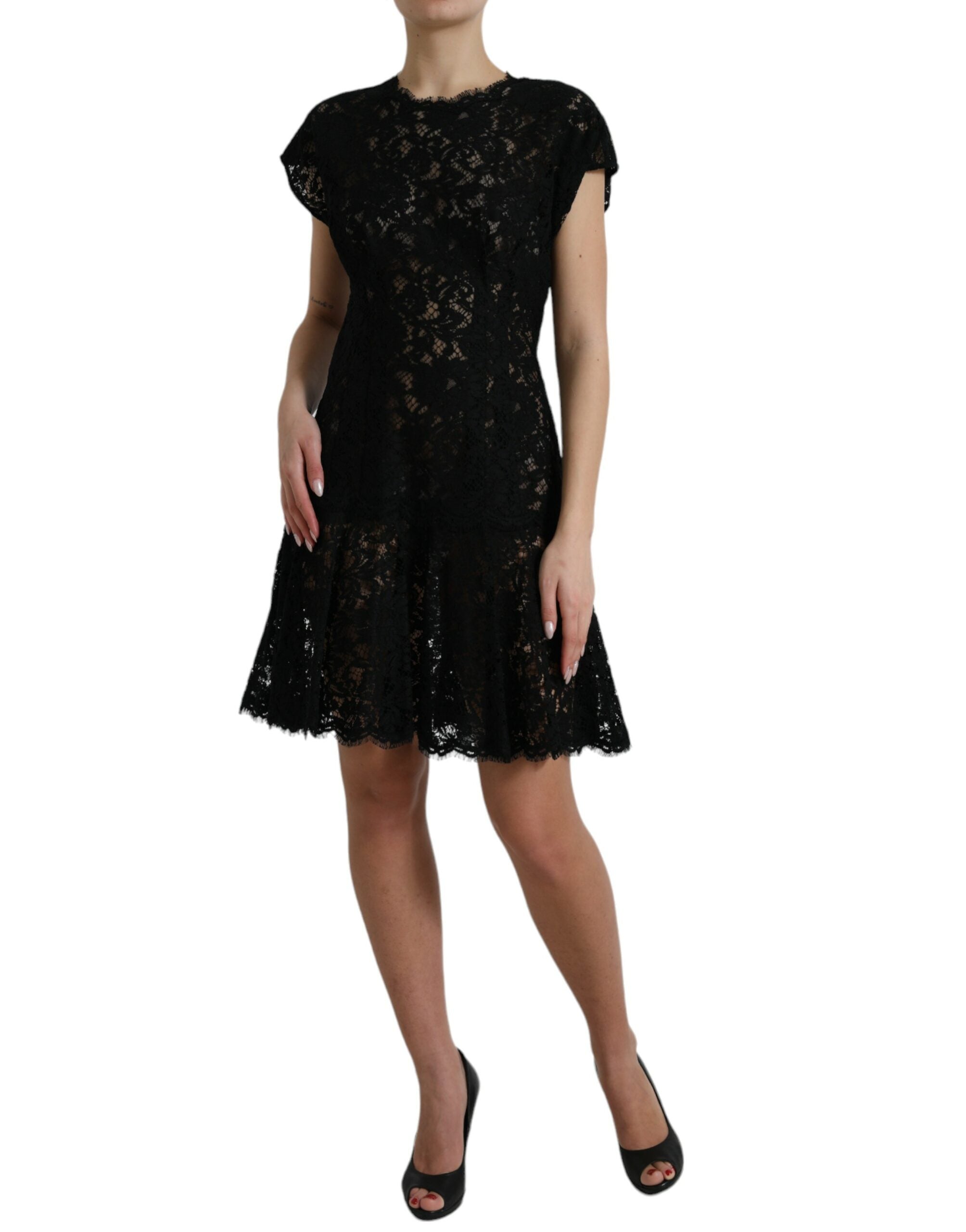 Black floral lace cotton A-line mini dress by Dolce & Gabbana, featuring intricate lace details and a classic silhouette.