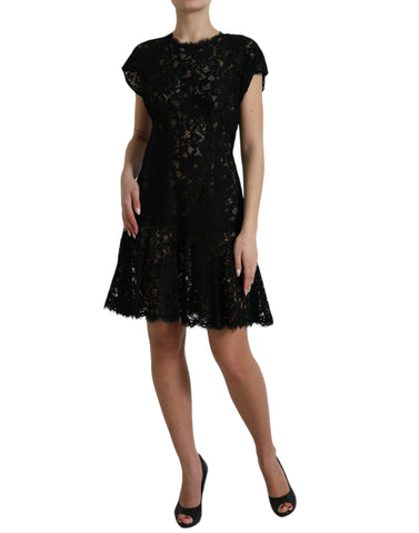 Black floral lace cotton A-line mini dress by Dolce & Gabbana, featuring intricate lace details and a classic silhouette.