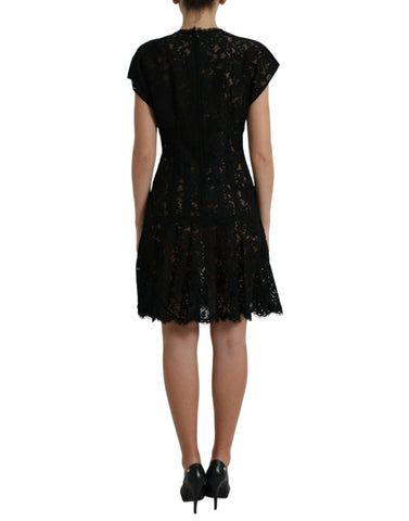 Black floral lace cotton A-line mini dress by Dolce & Gabbana, featuring a fitted bodice and floral lace detailing.