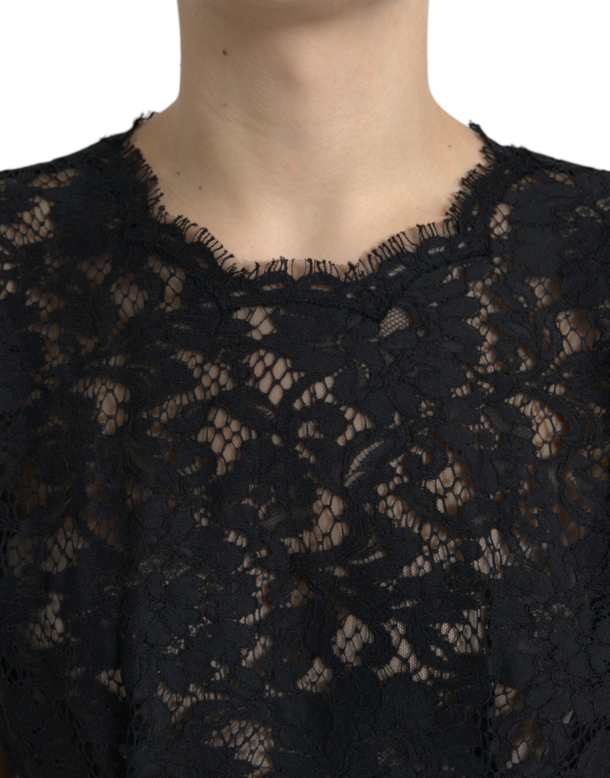Black floral lace cotton A-line mini dress by Dolce & Gabbana with intricate lace details and a fitted silhouette.