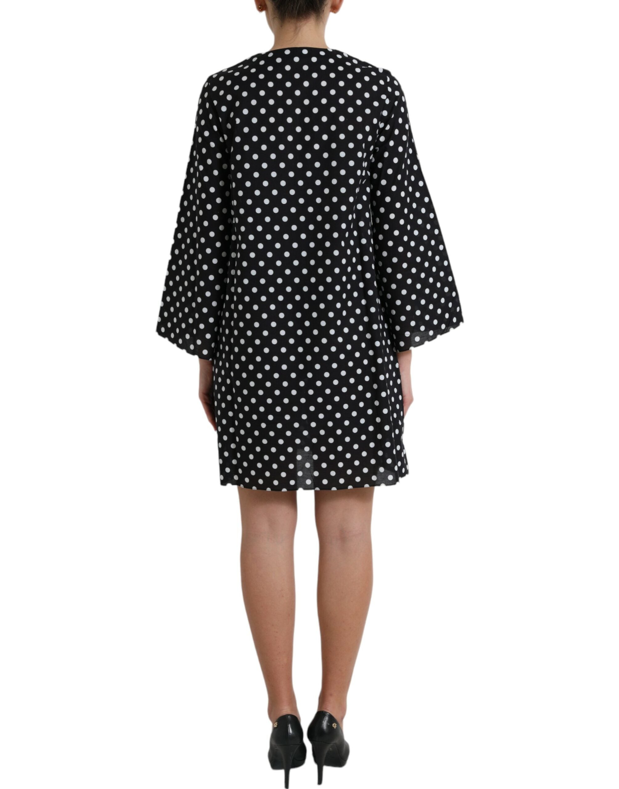Black and white polka dot nylon shift mini dress by Dolce & Gabbana, featuring a classic polka dot pattern and a stylish mini length.