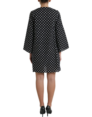 Black and white polka dot nylon shift mini dress by Dolce & Gabbana, featuring a classic polka dot pattern and a stylish mini length.