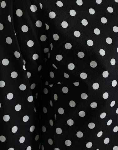 Black and white polka dot nylon shift mini dress by Dolce & Gabbana, featuring a stylish, lightweight design and classic pattern.