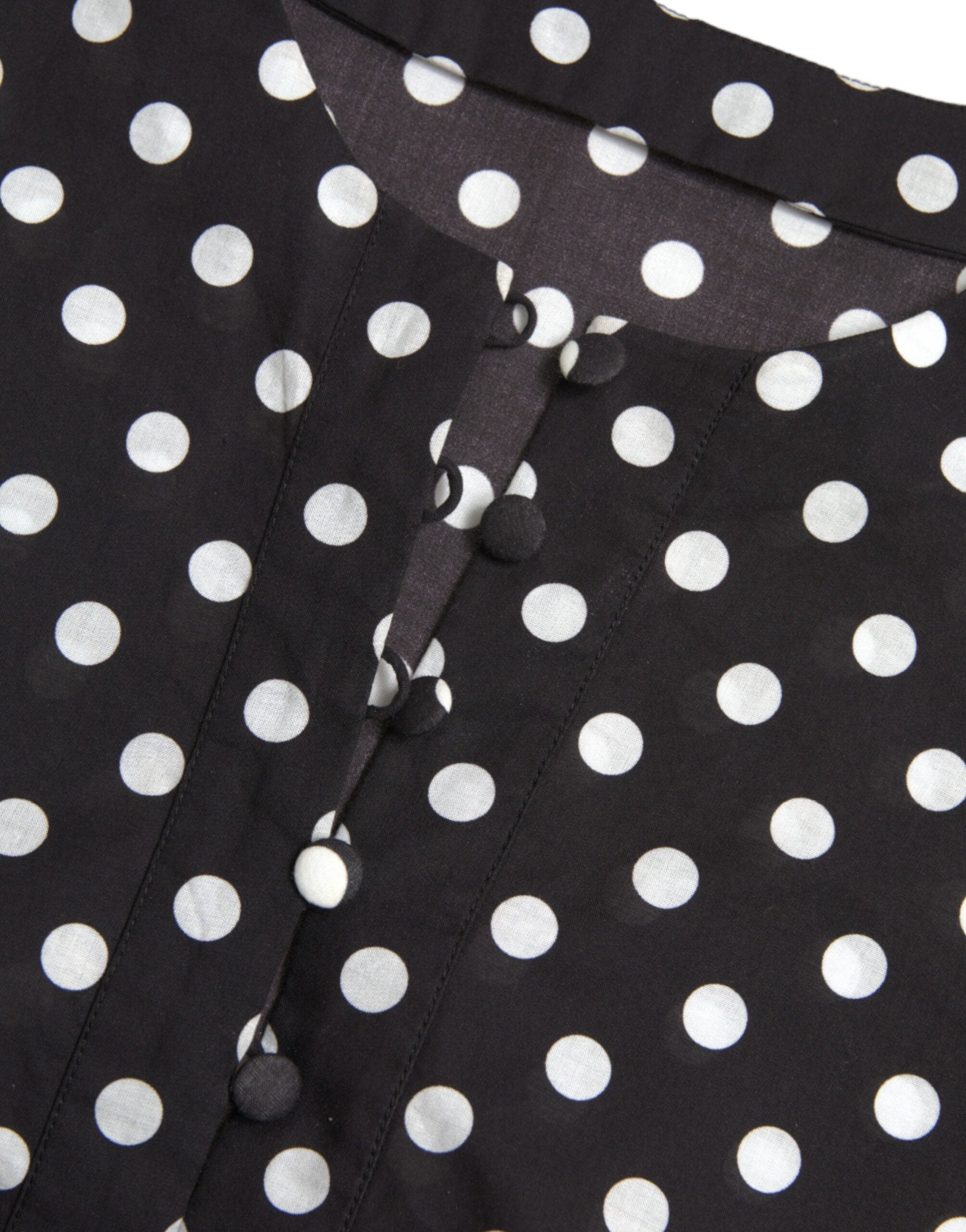 Black and white polka dot nylon shift mini dress by Dolce & Gabbana, featuring a stylish sleeveless design and a classic polka dot pattern.