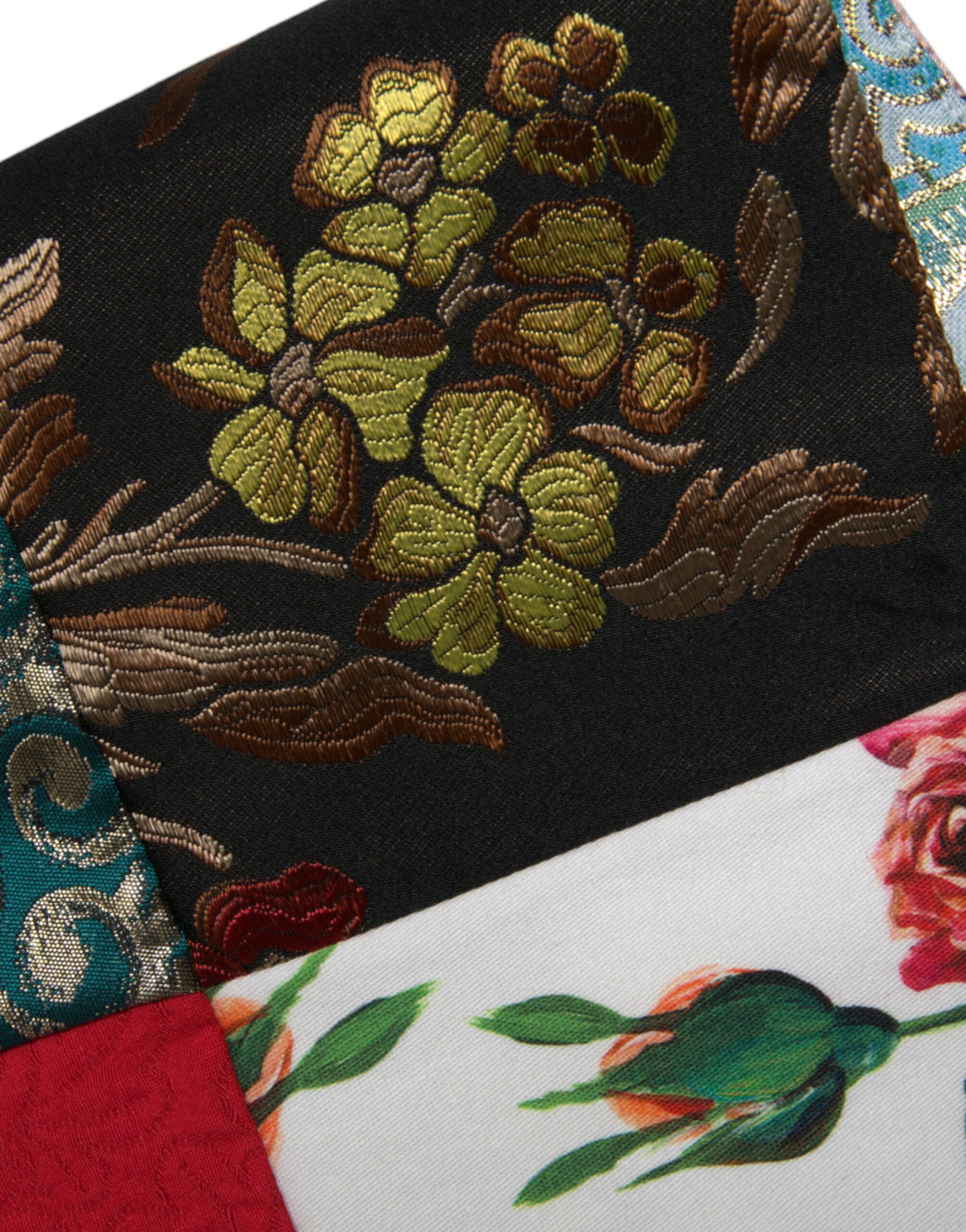 Multicolor floral patchwork shift mini dress by Dolce & Gabbana, featuring vibrant floral patterns and a sleek, stylish fit.