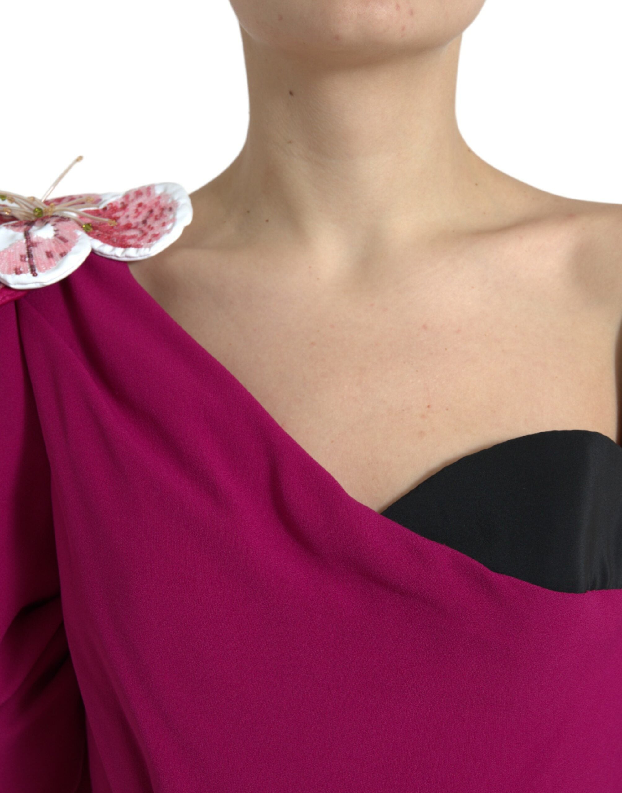 Purple flower-embellished one-shoulder dress by Dolce & Gabbana, featuring intricate floral details and elegant design.