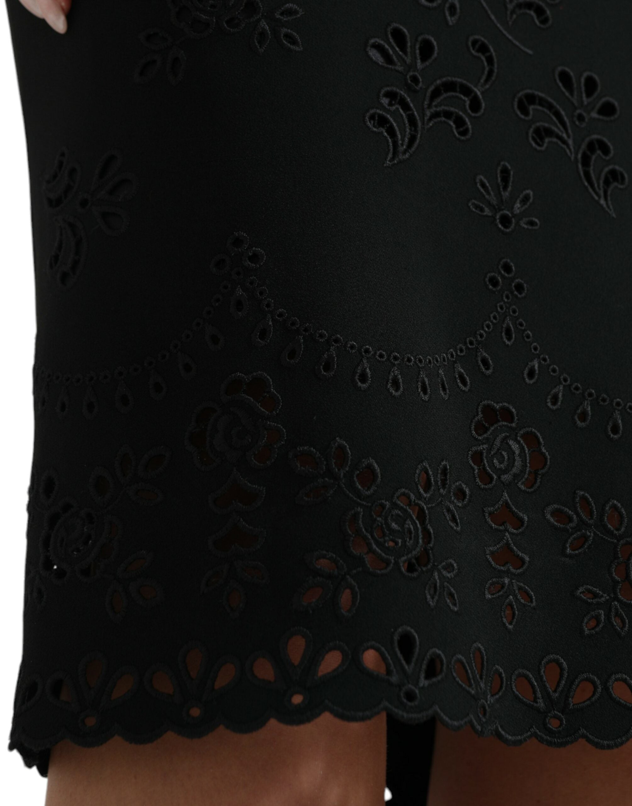 Black floral lace viscose bodycon midi dress by Dolce & Gabbana, featuring a fitted silhouette and intricate lace details.