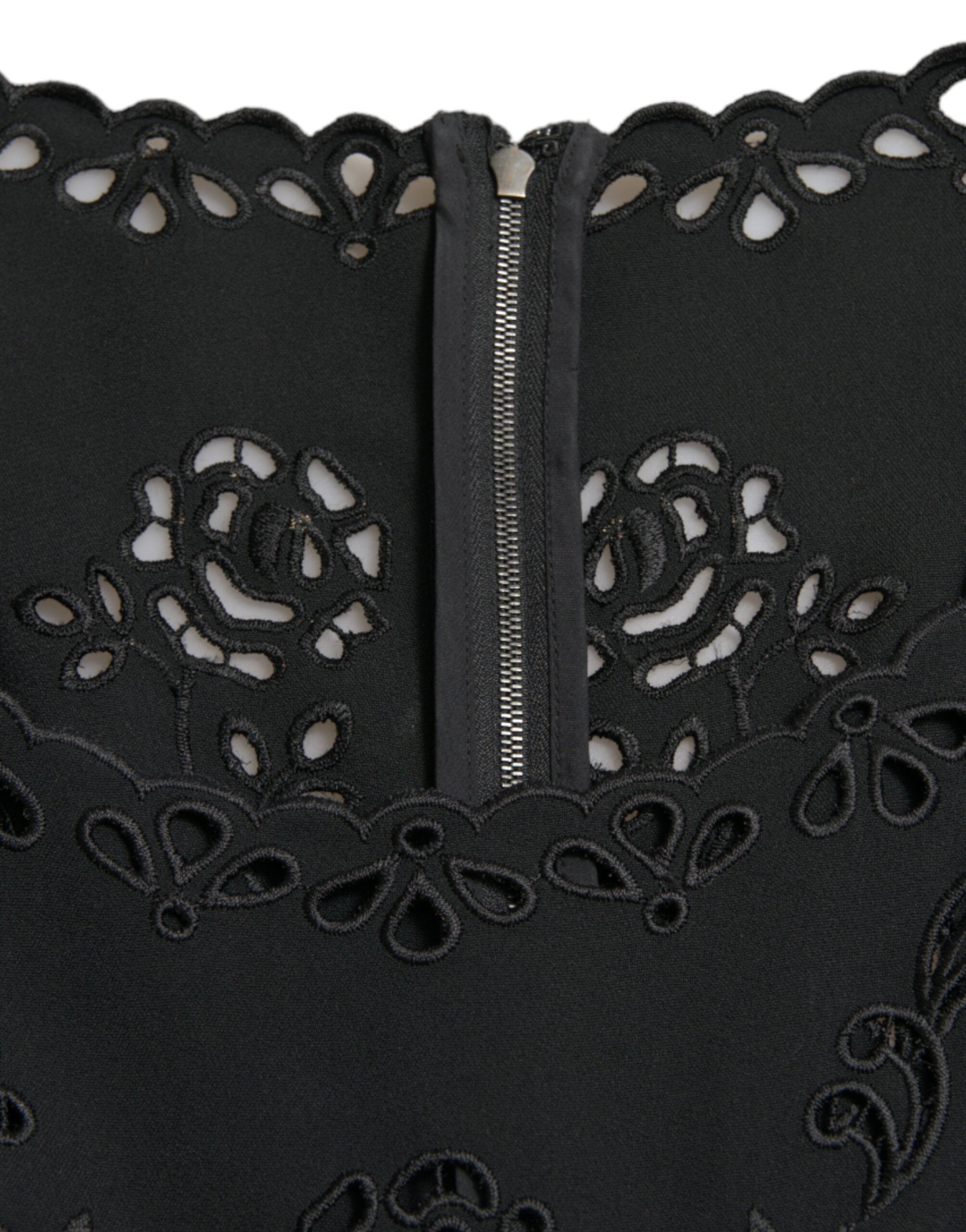 Black floral lace viscose bodycon midi dress by Dolce & Gabbana, featuring a fitted silhouette and intricate lace details.