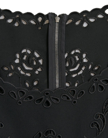 Black floral lace viscose bodycon midi dress by Dolce & Gabbana, featuring a fitted silhouette and intricate lace details.