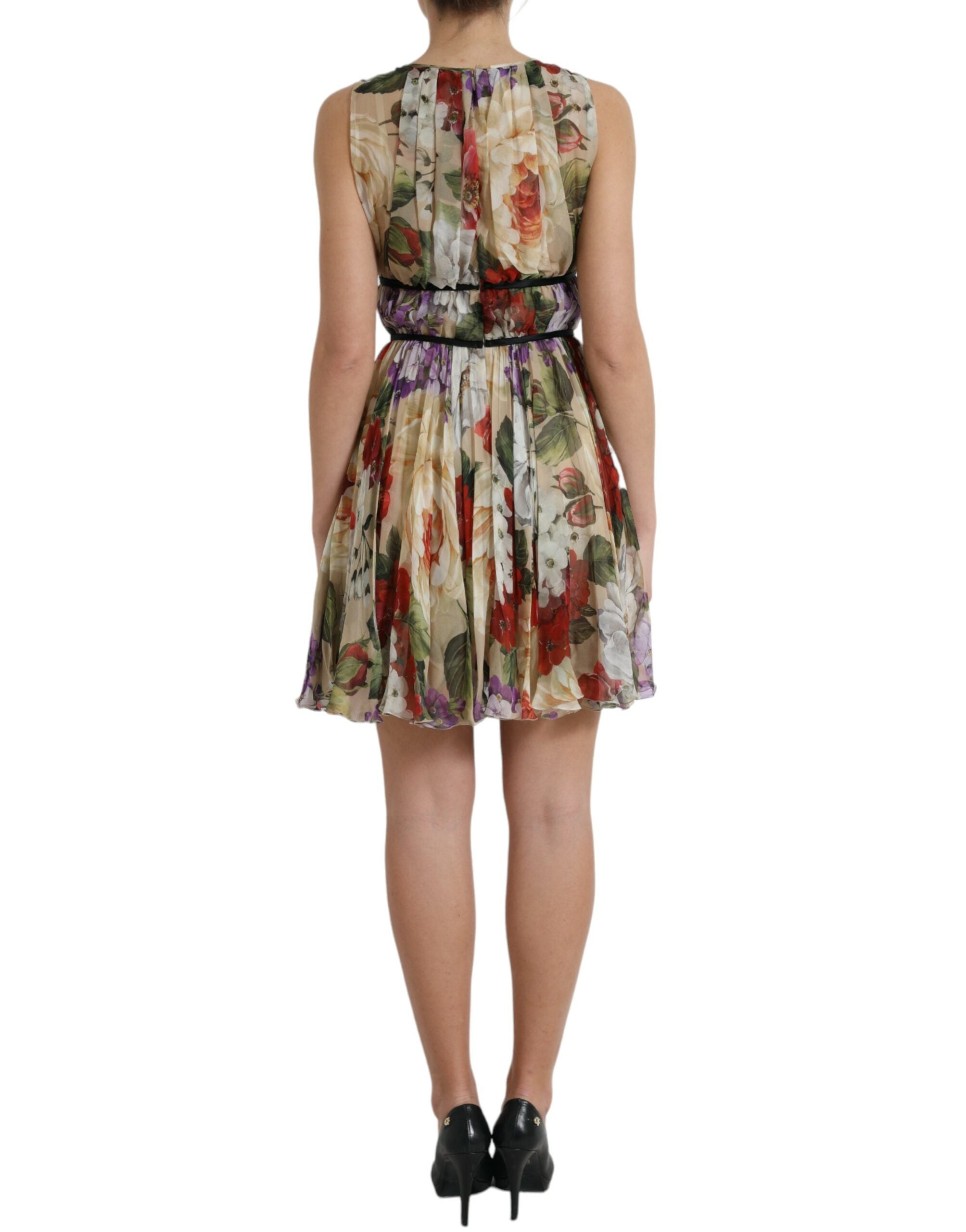 Beige floral sleeveless A-line mini dress by Dolce & Gabbana, featuring a fitted bodice and flowing skirt.