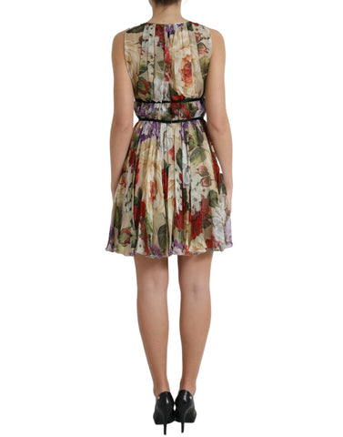 Beige floral sleeveless A-line mini dress by Dolce & Gabbana, featuring a fitted bodice and flowing skirt.