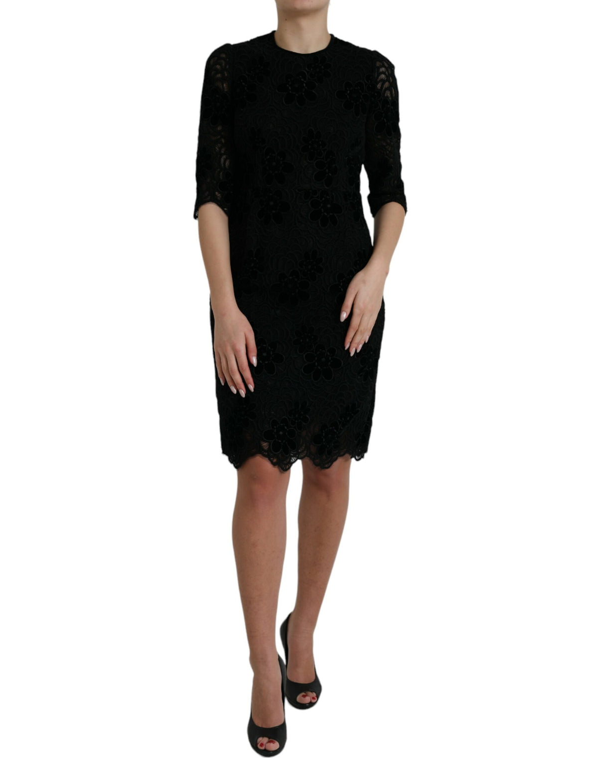 Black floral lace cotton bodycon dress by Dolce & Gabbana, featuring a fitted design with intricate lace details.