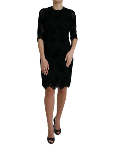 Black floral lace cotton bodycon dress by Dolce & Gabbana, featuring a fitted design with intricate lace details.