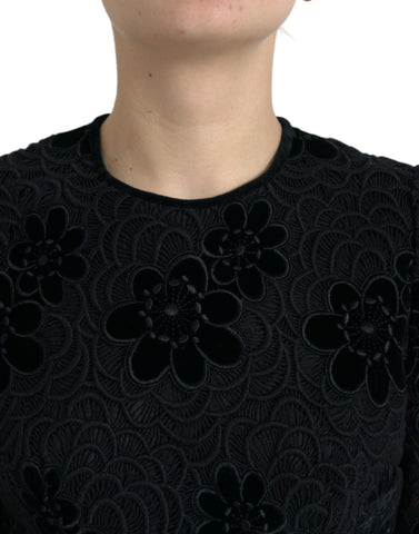 Black floral lace cotton bodycon dress by Dolce & Gabbana, fitted design with intricate lace details and floral pattern.