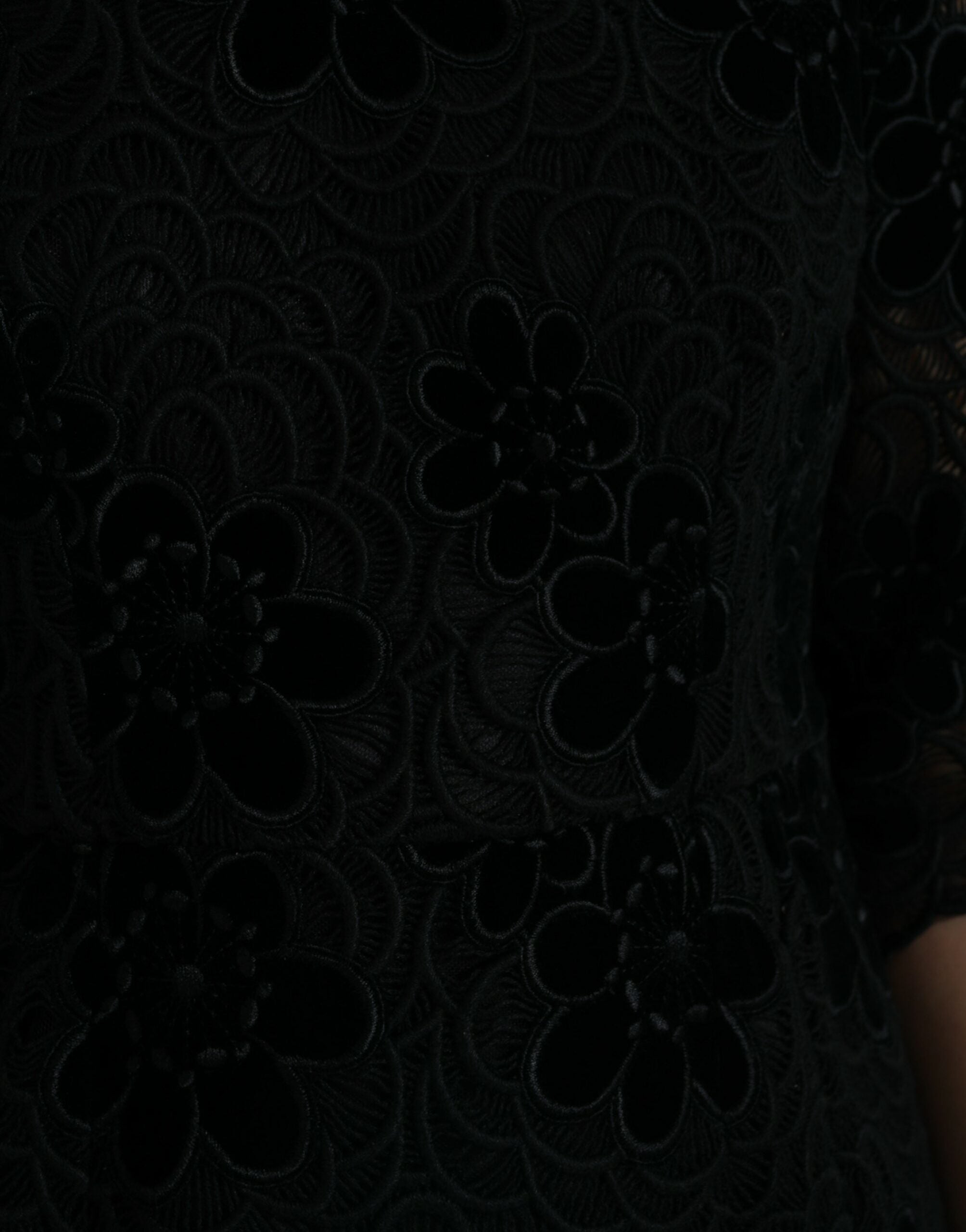 Black floral lace cotton bodycon dress by Dolce & Gabbana, featuring intricate lace details and a fitted silhouette.