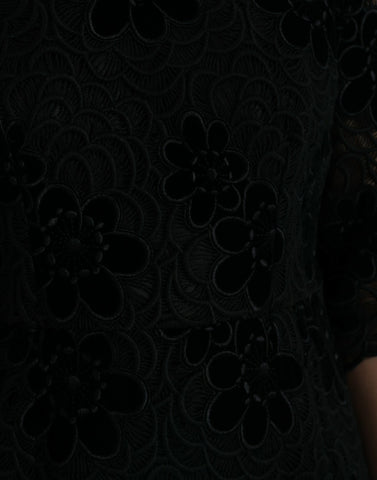 Black floral lace cotton bodycon dress by Dolce & Gabbana, featuring intricate lace details and a fitted silhouette.