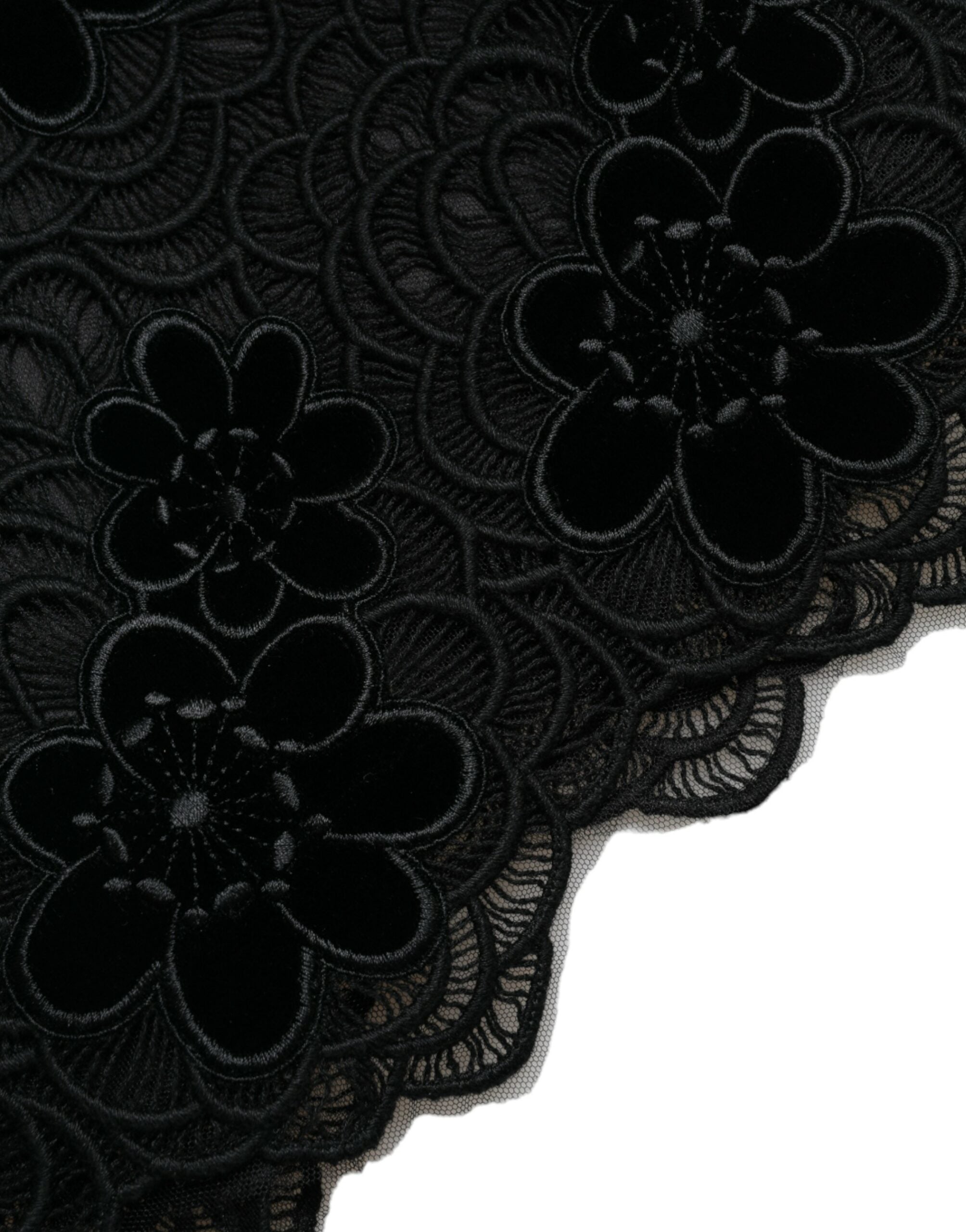 Black floral lace cotton bodycon dress by Dolce & Gabbana, showcasing fitted design with intricate lace details.