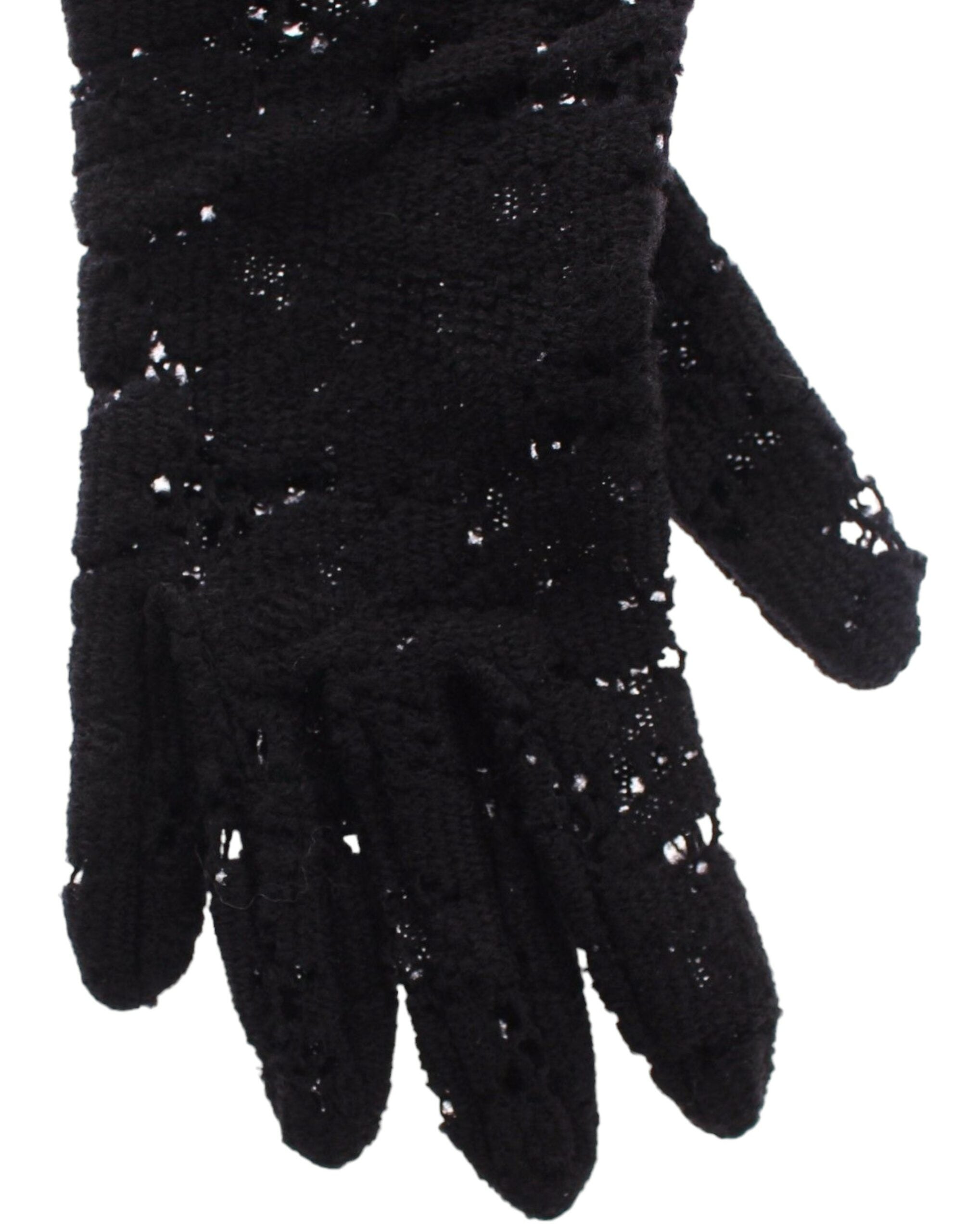 Black lace wool and lambskin fur elbow gloves by Dolce & Gabbana, featuring intricate lace details and plush fur trim.