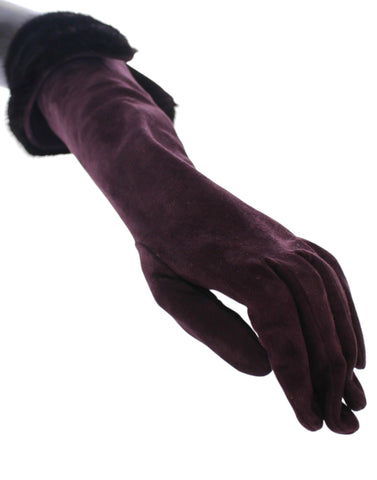 Purple mink fur and goatskin suede leather gloves by Dolce & Gabbana, showcasing soft texture and elegant design.