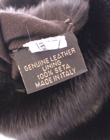 Purple mink fur and goatskin suede leather gloves by Dolce & Gabbana, showcasing soft, luxurious handwear with detailed stitching.