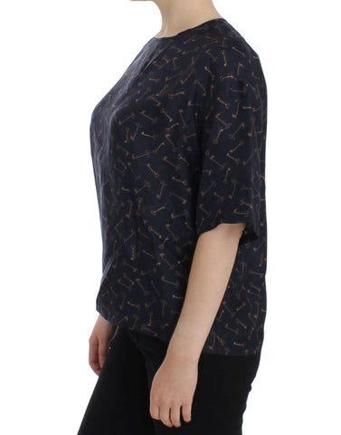 Blue silk blouse with gold key print from Dolce & Gabbana, featuring a stylish, elegant design and intricate detailing.