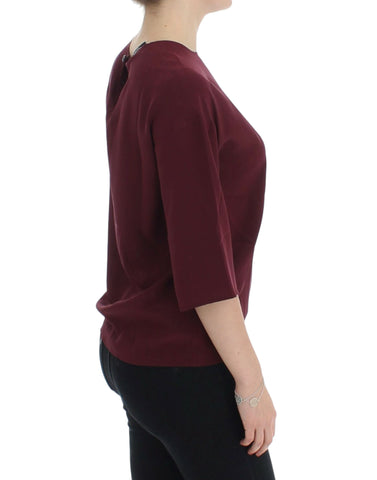 Red 3/4 sleeve silk blouse by Dolce & Gabbana, featuring elegant fabric and classic design, displayed on a white background.