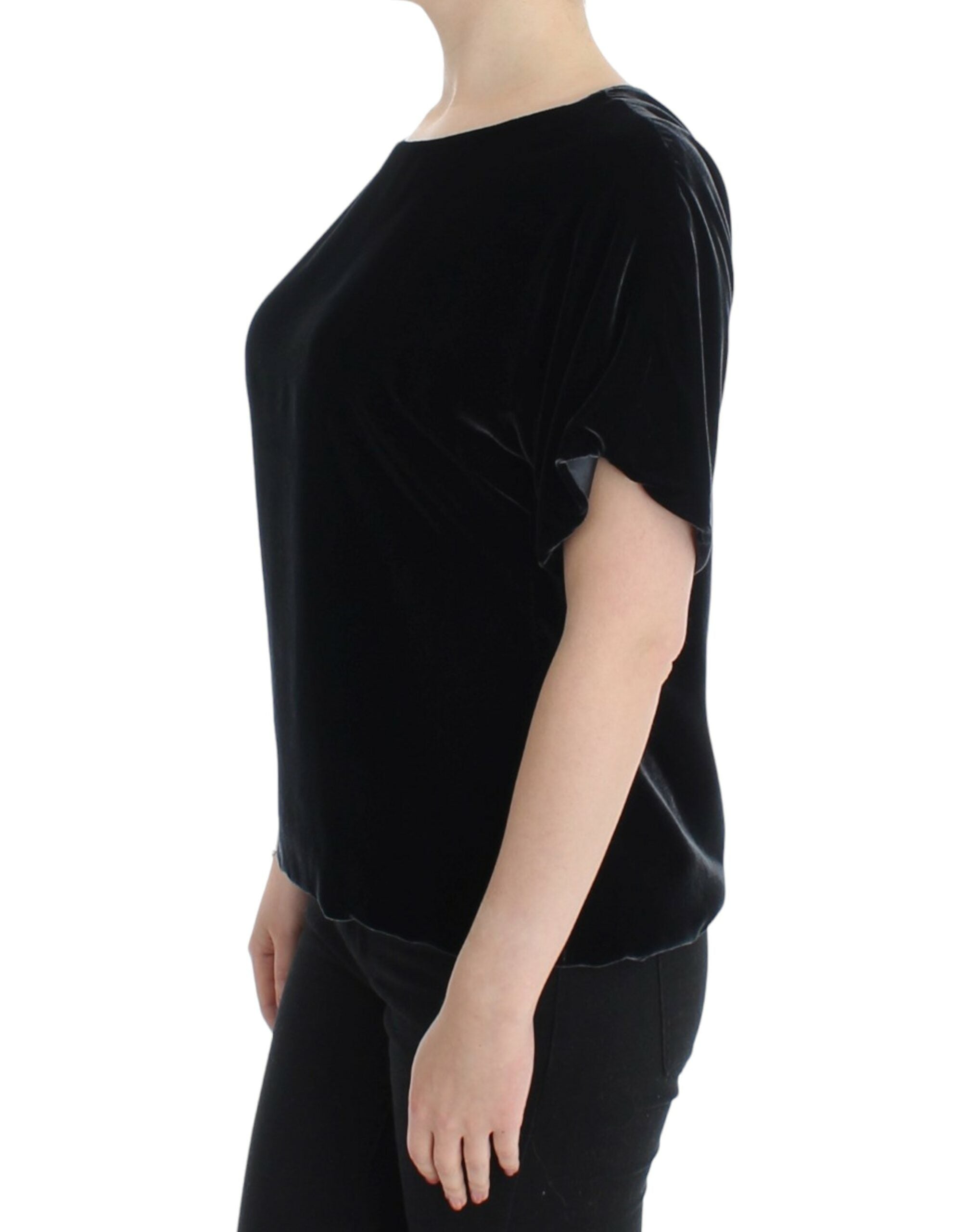 Black velvet blouse with short sleeves by Dolce & Gabbana, featuring a elegant, fitted design and subtle sheen.