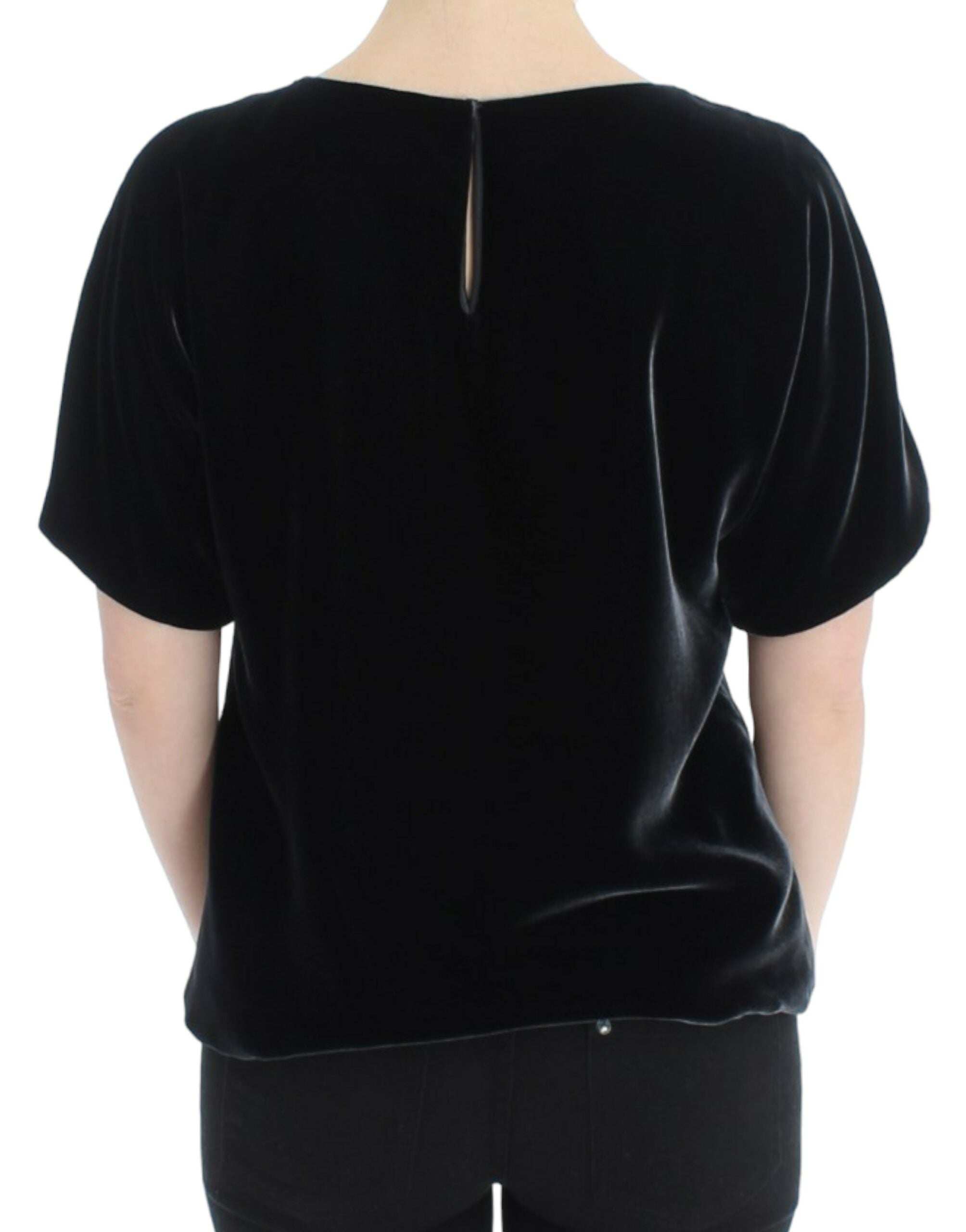 Black velvet shortsleeved blouse by Dolce & Gabbana, featuring a luxurious fabric and elegant design.
