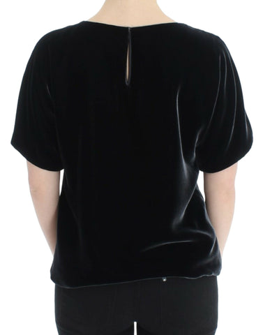 Black velvet shortsleeved blouse by Dolce & Gabbana, featuring a luxurious fabric and elegant design.