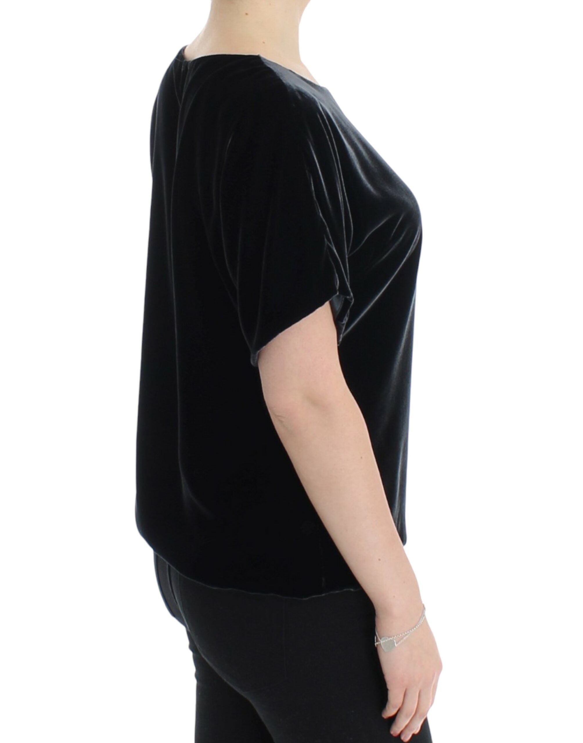 Black velvet short-sleeved blouse by Dolce & Gabbana, featuring a sleek, luxurious fabric with a classic fit and elegant design.