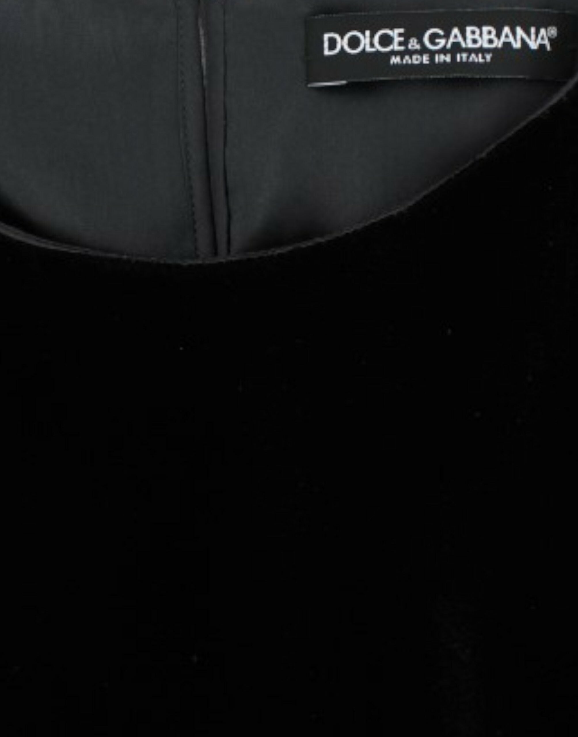 Black velvet blouse with short sleeves by Dolce & Gabbana, featuring a stylish, luxurious fabric and elegant design.