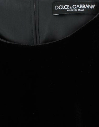 Black velvet blouse with short sleeves by Dolce & Gabbana, featuring a stylish, luxurious fabric and elegant design.