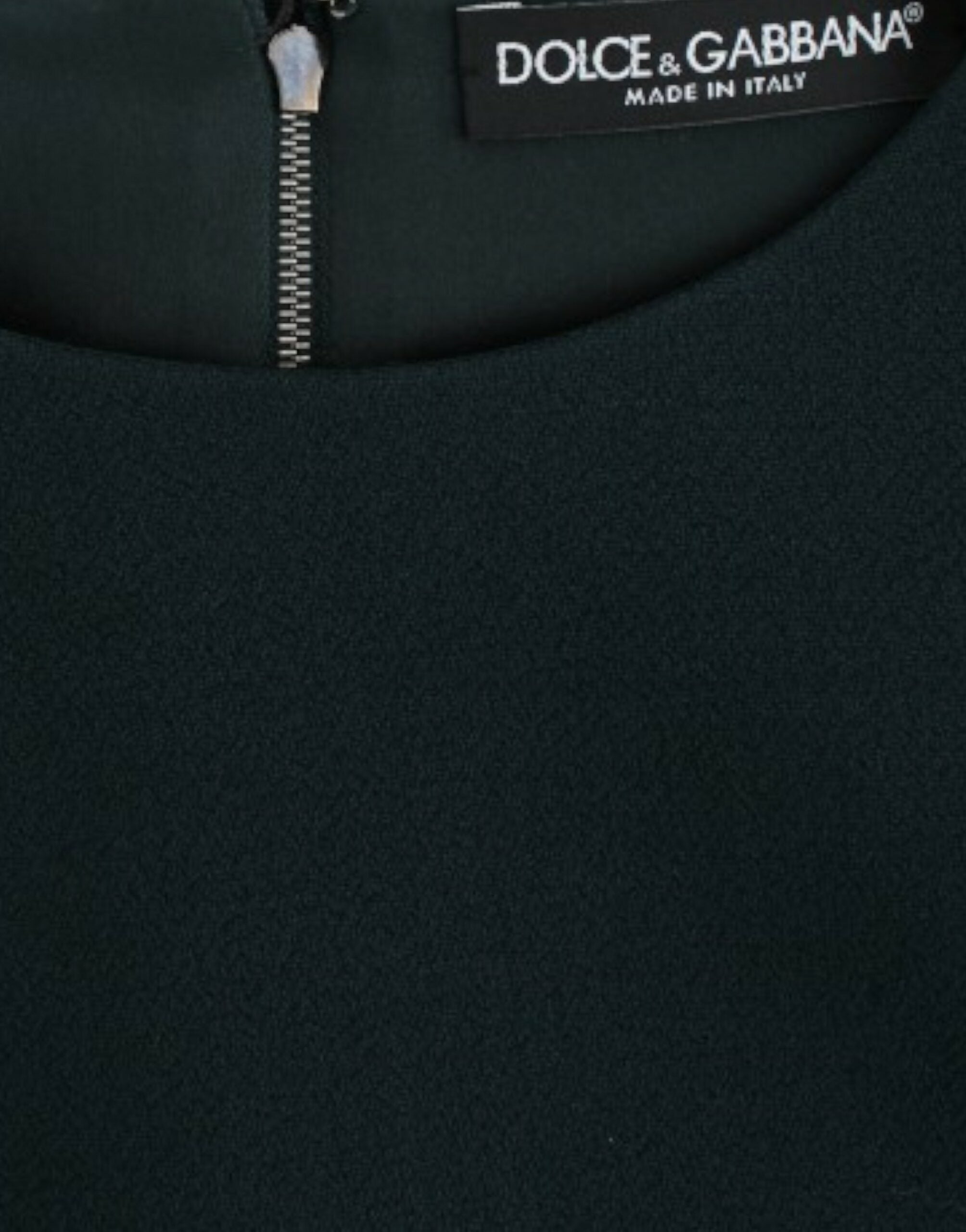 Green wool blouse with 3/4 sleeves from Dolce & Gabbana, featuring a classic fit and subtle textured fabric.