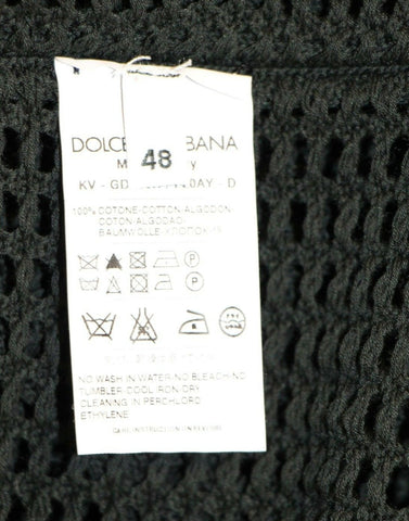 Dark green Dolce & Gabbana runway netted pullover sweater with a stylish, open-knit design and relaxed fit.