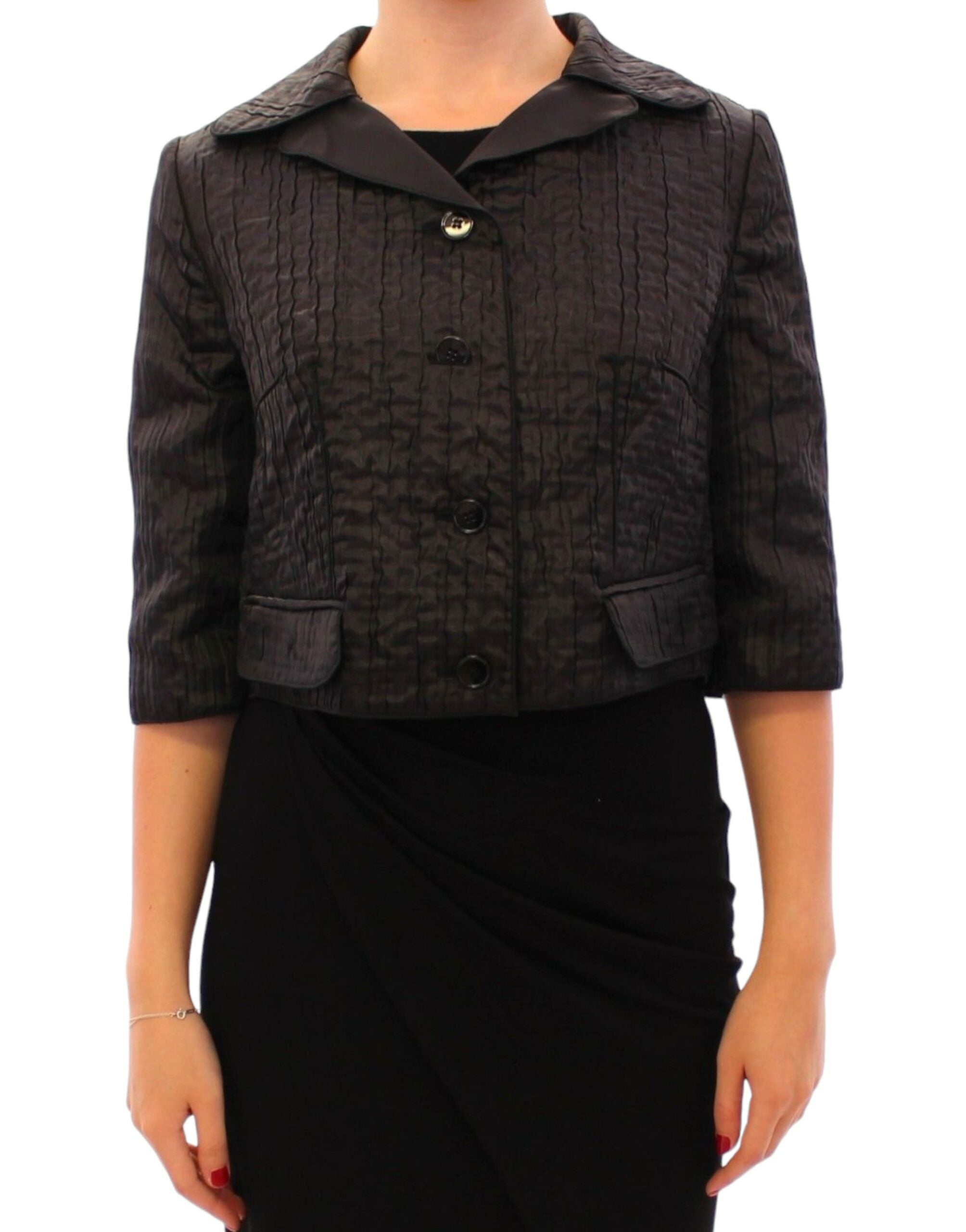 Black Dolce & Gabbana short bolero shrug jacket with cropped sleeves and elegant design, perfect for stylish evening wear.