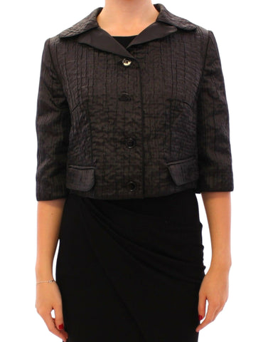 Black Dolce & Gabbana short bolero shrug jacket with cropped sleeves and elegant design, perfect for stylish evening wear.