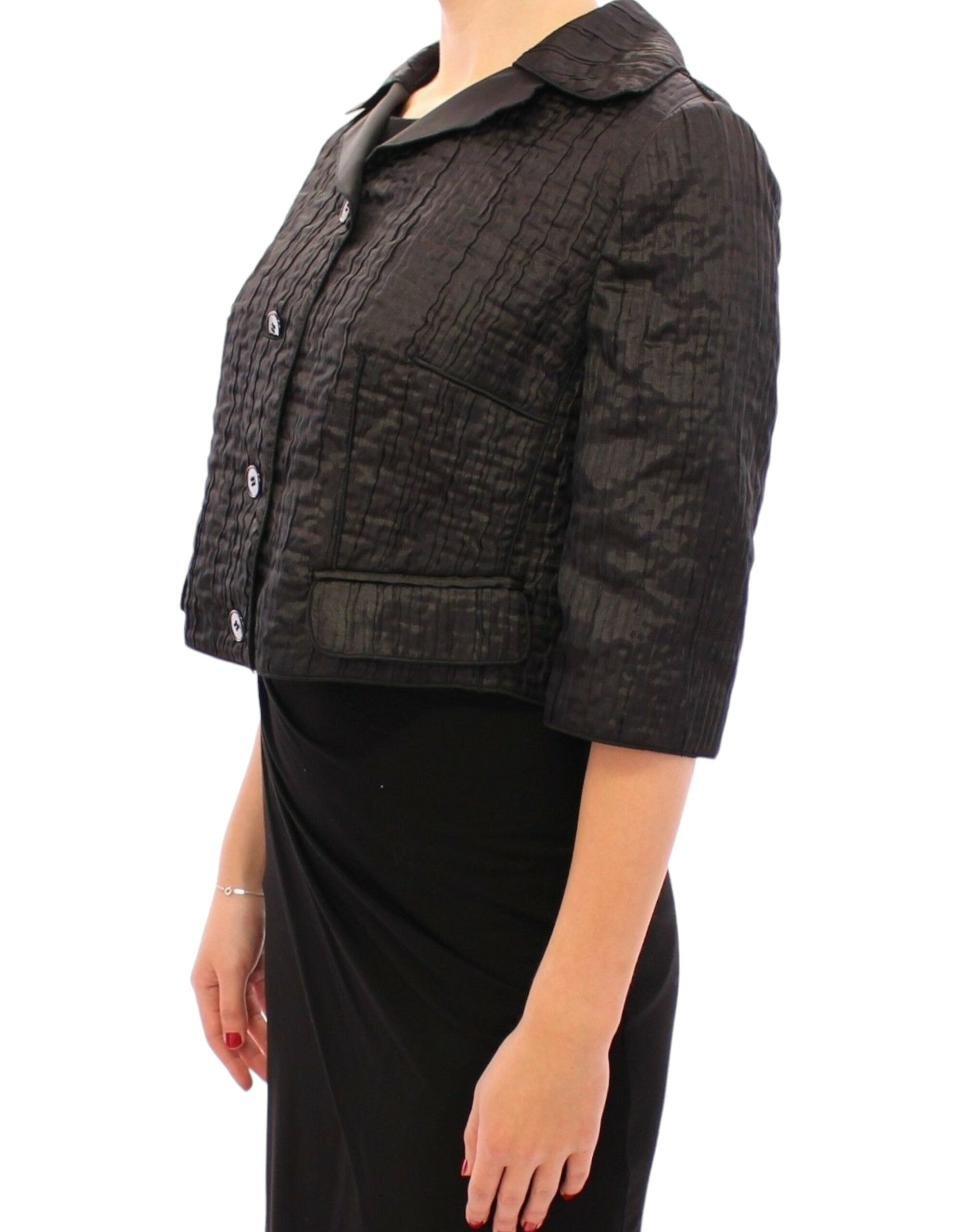 Black Dolce & Gabbana short bolero shrug jacket with long sleeves and fitted design, ideal for elegant evening wear.