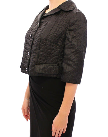 Black Dolce & Gabbana short bolero shrug jacket with long sleeves and fitted design, ideal for elegant evening wear.