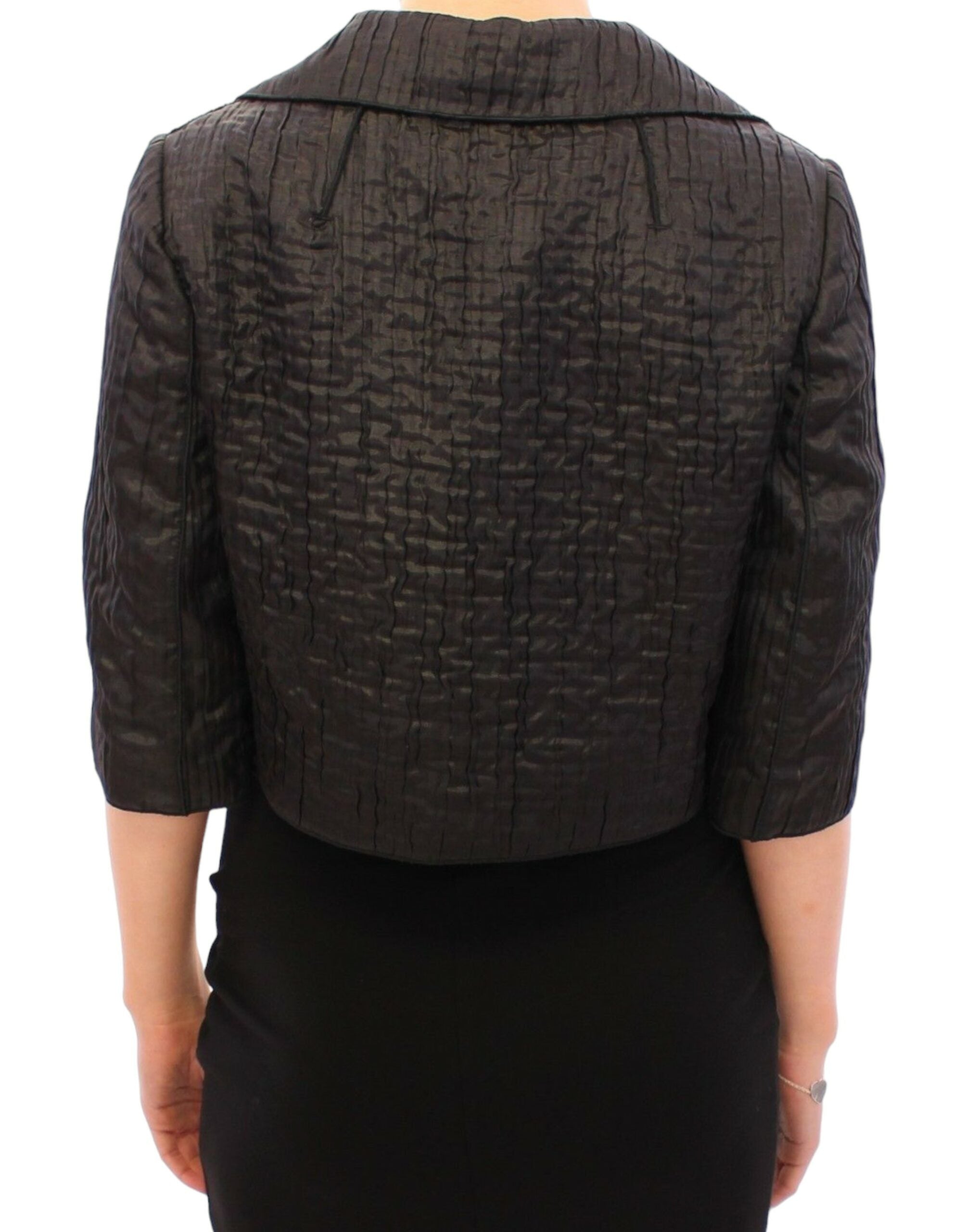 Black Dolce & Gabbana short bolero shrug jacket with long sleeves and open front, stylish for formal or casual wear.