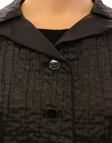 Black Dolce & Gabbana short bolero shrug jacket with long sleeves and fitted style, perfect for elegant evening wear.