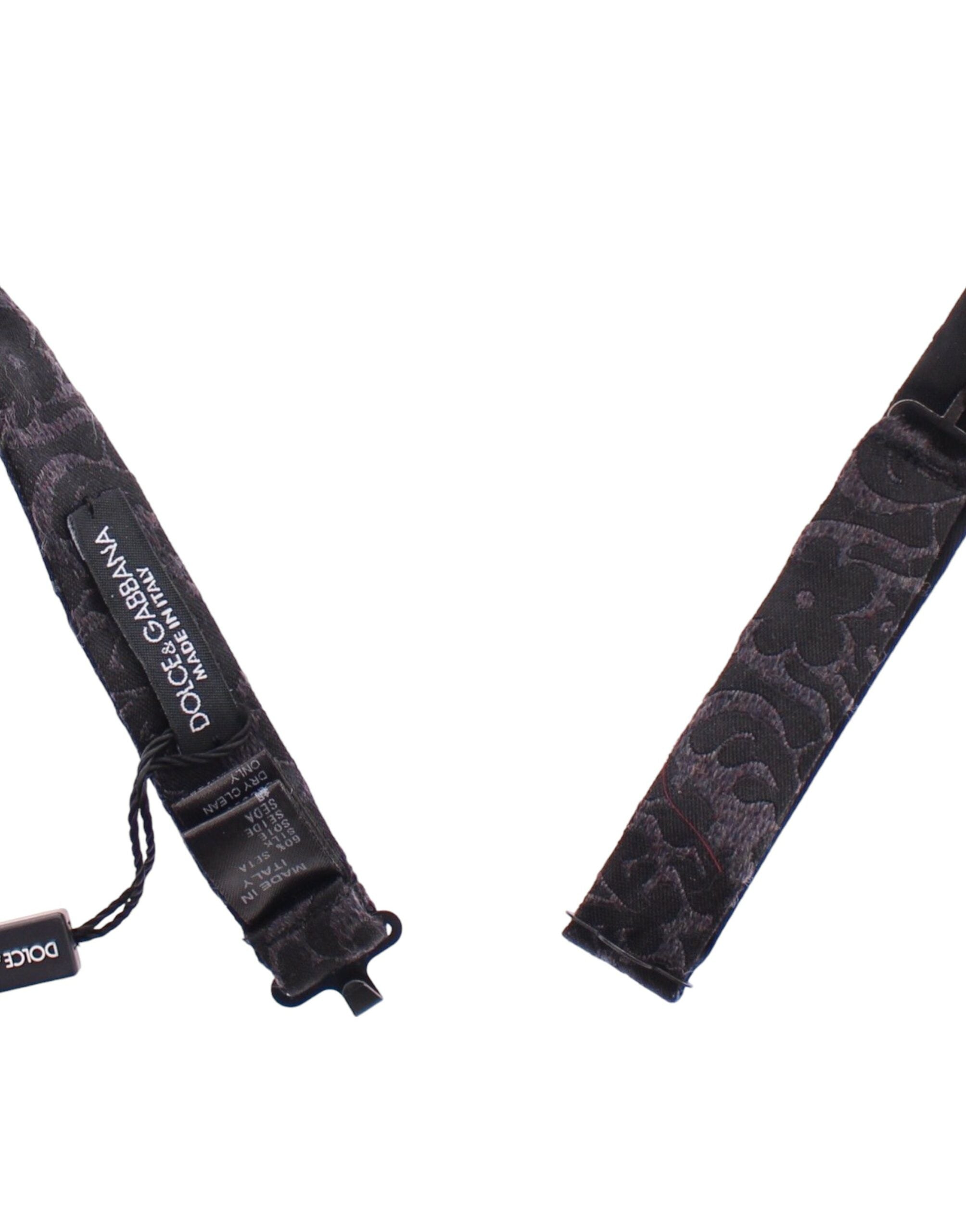 Gray and black wool bow tie by Dolce & Gabbana, showcasing a stylish and elegant accessory with a textured fabric finish.