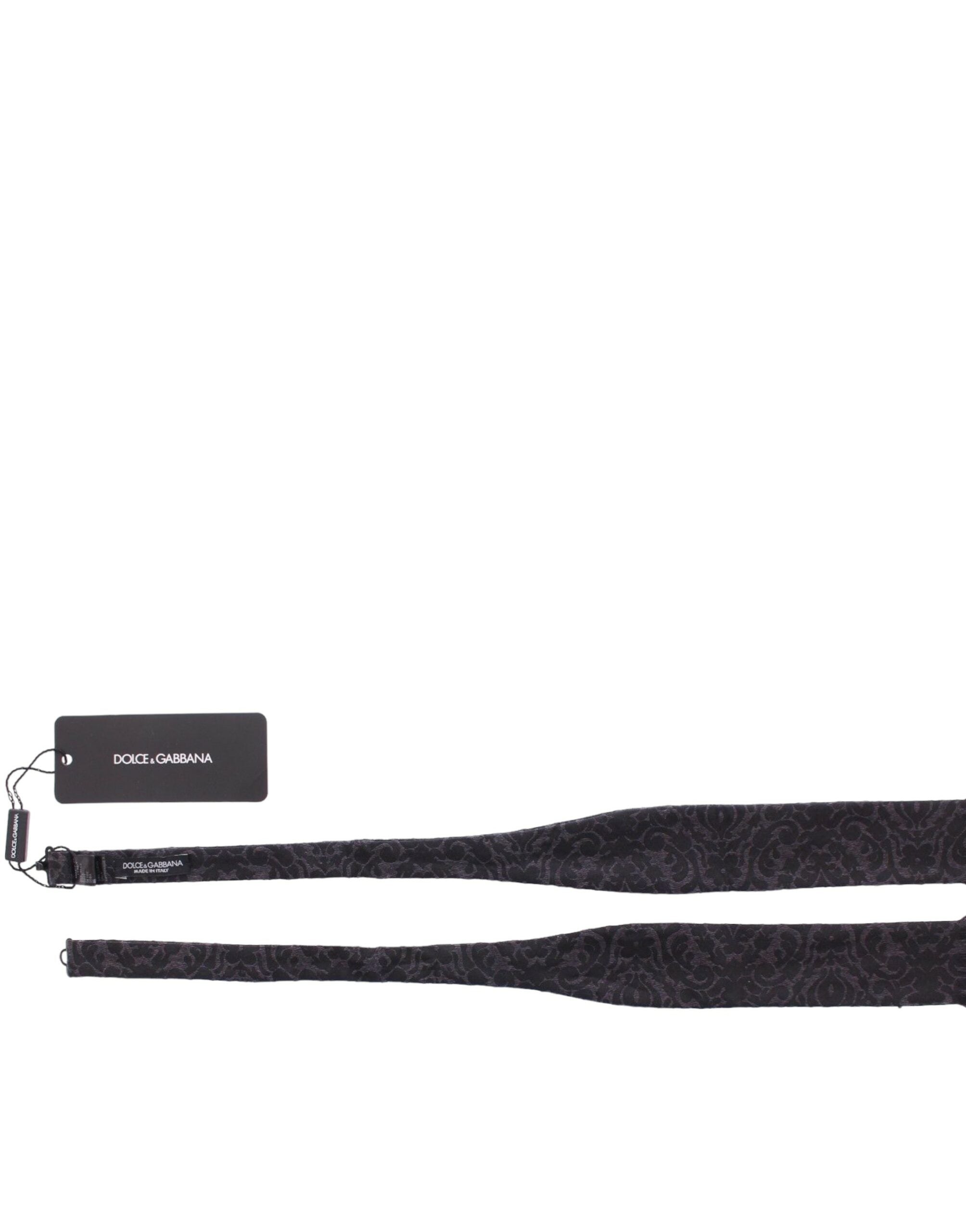Gray and black wool bow tie by Dolce & Gabbana, featuring a classic, elegant design perfect for formal occasions.