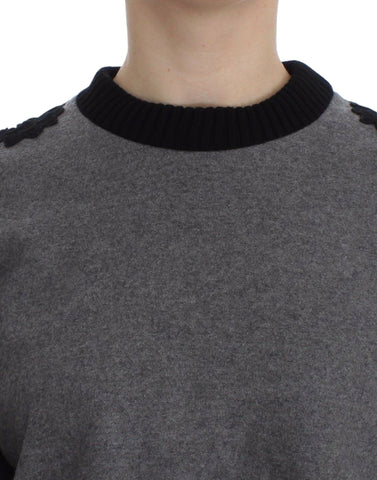 Gray and black lace wool cashmere sweater by Dolce & Gabbana featuring intricate lace details and a cozy fit.
