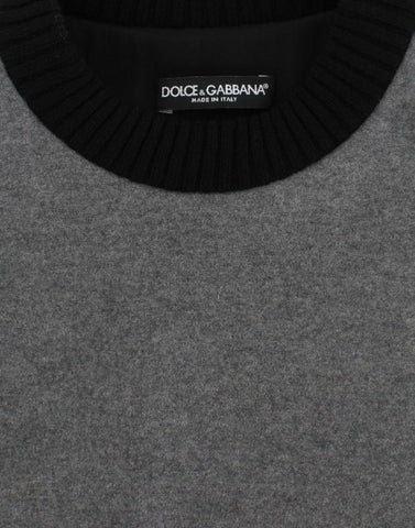 Gray and black lace wool cashmere sweater by Dolce & Gabbana, showing close-up of textured knit and intricate lace details.