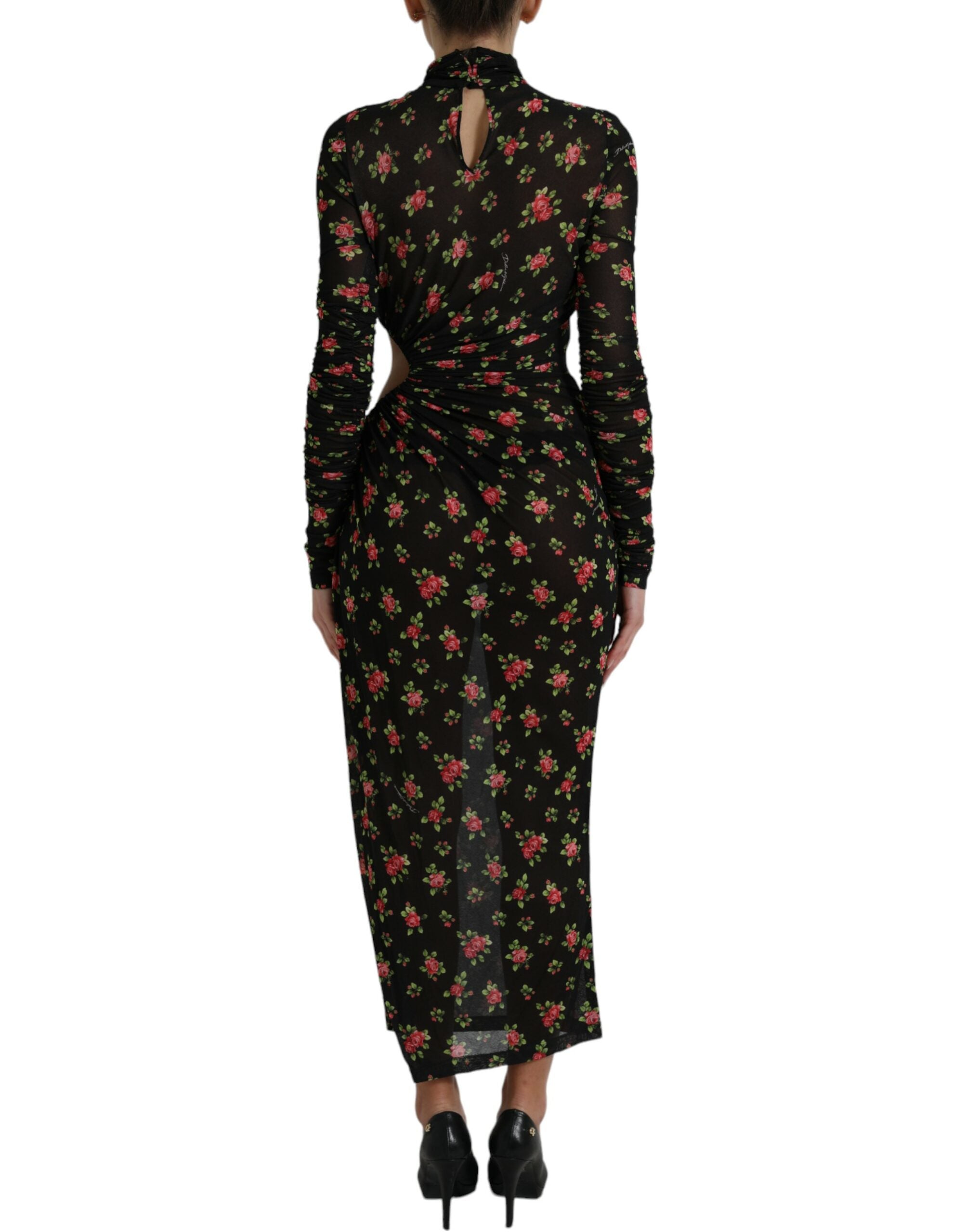 Black floral cut-out sheath long maxi dress by Dolce & Gabbana, featuring intricate floral patterns and a fitted silhouette.