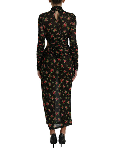 Black floral cut-out sheath long maxi dress by Dolce & Gabbana, featuring intricate floral patterns and a fitted silhouette.